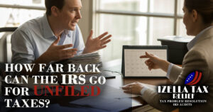 Tax relief expert Izella Lui helping a client resolve back taxes in her Daly City, California office