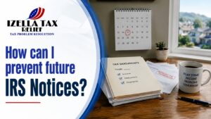 Bay Area homeowner organizing tax records at the kitchen table, a practical step in how to avoid IRS letters California families deal with