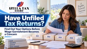 San Mateo County homeowner organizing tax folders by year to get ahead of unfiled tax returns wage garnishment issues